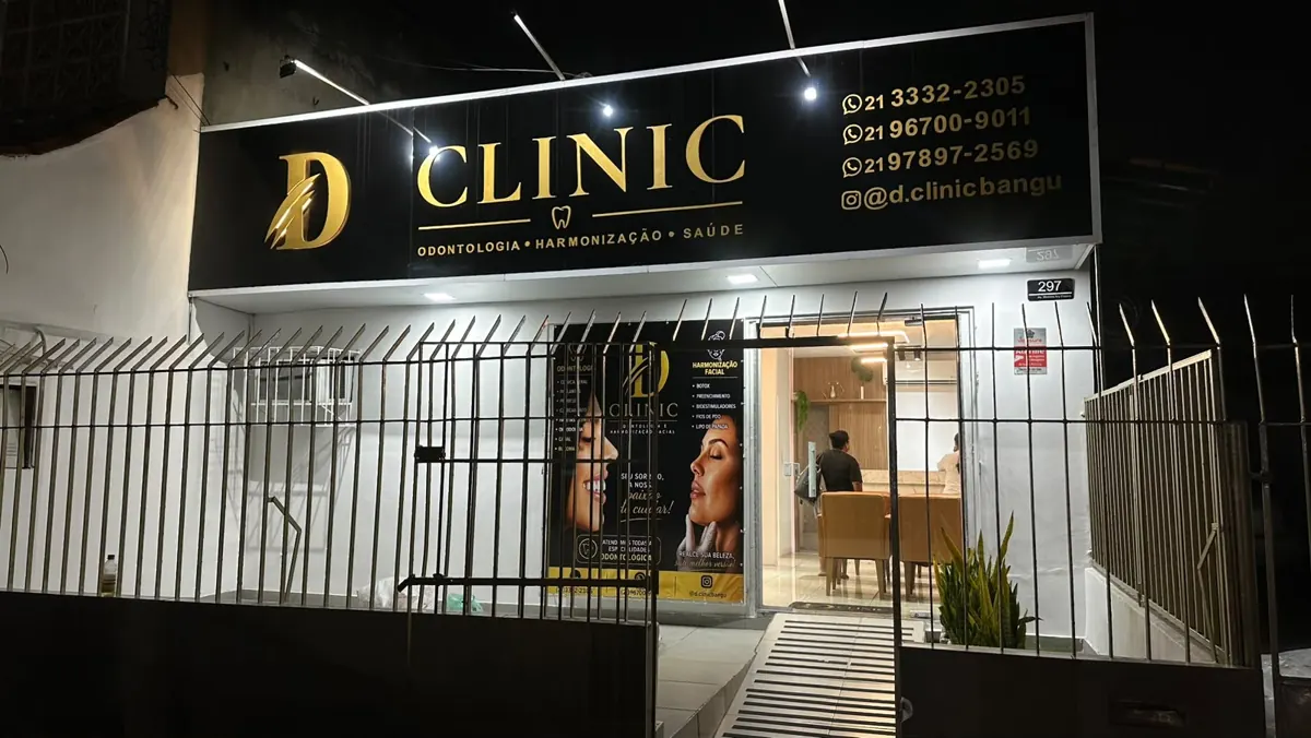 Nova fachada preta e dourada da clínica odontológica D Clinic em Bangu